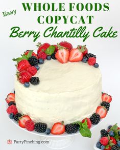 there is a cake with berries on it and the words, easy whole foods copycat berry chastily cake