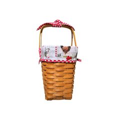 a brown basket with a red and white checkered bow on the handle is shown