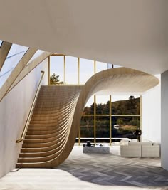 the interior of a modern house with stairs