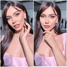 a woman in a pink dress posing for the camera