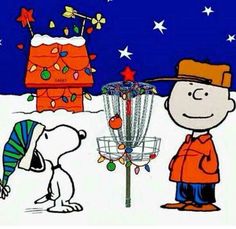 a charlie brown christmas card with a dog and a frisbee