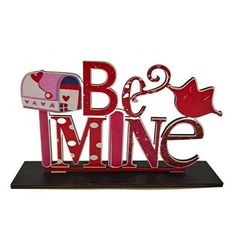 a wooden sign that says be mine