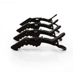 These Jumbo Croc Clips are perfect to work with long, voluminous hair. These salon clips are designed for a superior grip   on a larger surface area,   giving stylists   better   control. Rubberized finish prevents slippage Ergonomic thumb-grip. Unique double-hinged design. Stain-resistant. 5.5" Length, about 1" longer than our standard Croc Clips SHOP THE SET - 4pk Croc Clips Long Voluminous Hair, Professional Stylist, Voluminous Hair, Hair Colorist, Professional Hair, Professional Hairstyles, The Professional, Hair Salon, Bobby Pins