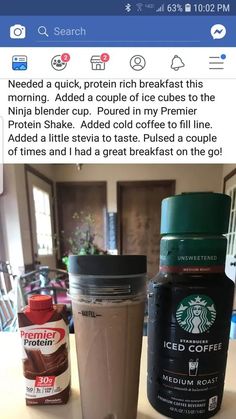 a cup of coffee sitting on top of a table next to a jar of ice cream