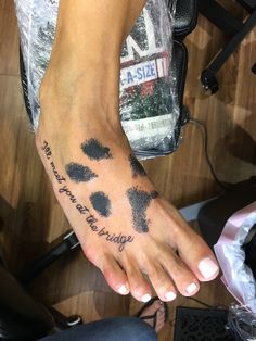 a person's foot with black ink that says, you are not afraid to believe