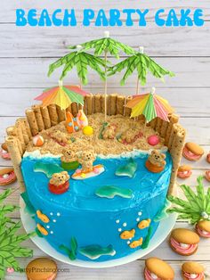 a birthday cake decorated with an image of a beach party