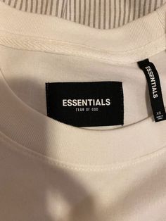 Clothing Brand Design, Fear Of God Essentials, Shirt Design Inspiration, Shirt Print Design, Garment Labels, Clothing Tags, Fear Of God