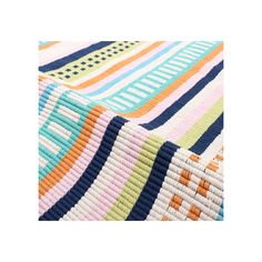 a multicolored rug with stripes on it