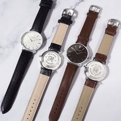 We knows that a successful wedding day starts with happy groomsmen. So we've designed a set of handsome, custom watches just for them. Our stainless steel watch is durably constructed with a genuine leather strap, and can be engraved with different name designs. It's the perfect gift for your best men, and a lasting reminder of your special day. Order now and let us help make your wedding dreams come true. --- ITEM SPECIFICATIONS --- * Type: Quartz Movement, Battery Powered * Case Material: Stainless Steel * Dial Diameter: 41mm * Case Thickness: 8mm * Glass: Mineral Crystal * 3 ATM Water Resistant - Rain/Splash Resistant * Band Length: 232mm * Band Width: 20mm * Band Material: Genuine leather  --- CARE GUIDE --- * 3 ATM watches should not be exposed directly to water. We recommend taking o Classic Wedding Watches With Metal Dial, Engraved Watch On Wedding Day, Watch For Wedding Gift Grooms, Grooms Watch Gift Wedding Day, Groomsmen Gifts Watch, Groom Watch Engraving, Groomsmen Watches, Groomsmen Gift Set, Personalized Watches