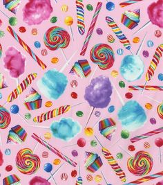 a pink background with colorful candies and lollipops on it's sides