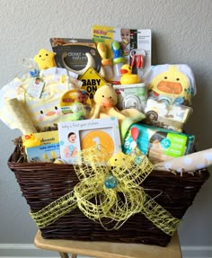 a baby gift basket with toys and books