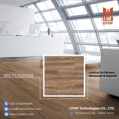 an advertisement for a flooring company with wood floors and white furniture in the background