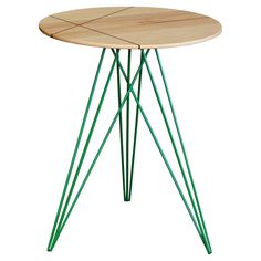 a wooden table with green metal legs and a circular top on an isolated white background