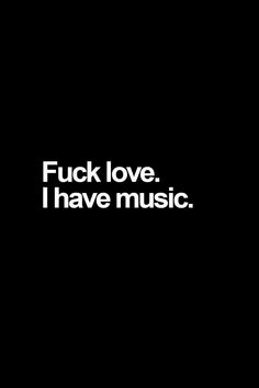 a black and white photo with the words f k love i have music on it