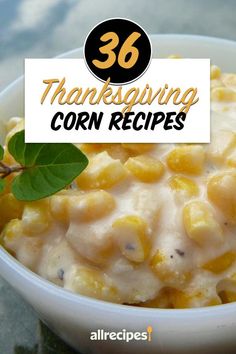 a white bowl filled with corn and topped with a green leaf next to the words, thanksgiving corn recipes