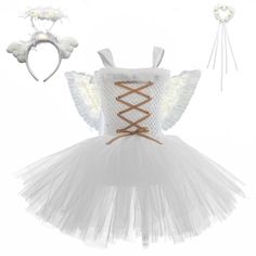 a white dress with angel wings and headband