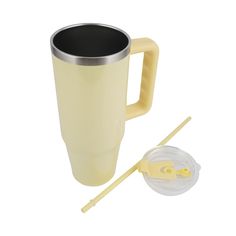 a yellow coffee mug with handle and lid next to a plastic straw holder on a white background