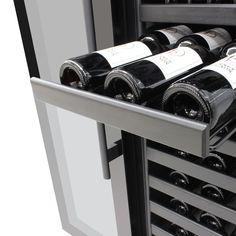 The sleek Vinotemp Butler Series 36 Inch Double Door Wine Cooler allows you to accurately control the temperature of your favorite wine bottles with two exact temperature controlled zones. This unit features two dual paned glass doors with pole handles that separate the wine storage in the left zone and right zones. Outfitted with 15 Ouzo gliding wire racks with black lip on each zone, this wine cooler can hold approximately 180 bottles in the two cooling zones combined. This state of the art co Ouzo, Wine Coolers, Wire Racks, Double Door, Wine Storage, Wine Cooler, Wine Bottles, Double Doors, Indore