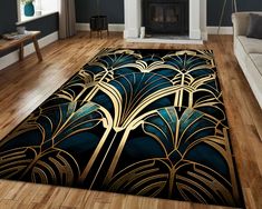 a living room area rug with an art deco design in gold and blue on the floor