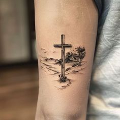 Vibrant Strength Cross Tattoo Master Files Cross For Men Tattoo, Calvary Tattoo Crosses, Christian Upper Arm Tattoo Men, Usmc Memorial Tattoo, Oceans Where Feet May Fail Tattoo, Tattoos That Represent Strength For Men, Bible Tattoo Ideas For Men, Mens Faith Tattoos, Starter Sleeve Tattoo For Men