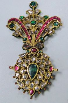 A beautiful rare find antique turban pin from the house of Maharaja of Rajasthan, encrusted with old mine cut Diamonds, Rubies, Emeralds set in 20 carats solid Gold and back adorned with multicolor enamel exquisite work, Detailed Kundan Meen work an Original classic collectors piece which could be easily adopted into two individual pendants or Brooch and a pendant. a very versatile piece in good condition. Size of piece-9.5/5.5 cm, total weight-45.6 grams(1.60 ounces). Material-solid 20 carat go Dhoti Function, Rajput Wedding, Mughal Jewelry, Wedding Symbols, Royal Diamond, Polki Necklace, Ruby Emerald, Turkish Jewelry, Royal Jewels