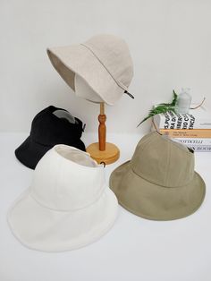 - 60% Linen, 40% Cotton - Adjustable Back Elastic with Stopper - Lightweight, Breathable -Ponytail Hat - Foldable/Packable Casual Lightweight Visor Bucket Hat, Khaki Visor Hat For Spring, Adjustable Khaki Hat, Adjustable Casual Bucket Hat With Visor, Casual Adjustable Visor Bucket Hat, Adjustable Casual Visor Bucket Hat, Solid Color Sun Hat Cap, One Size Fits Most, Solid Color Sun Hat One Size Fits Most, Lightweight Khaki Hat With Curved Brim