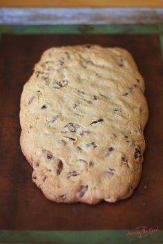 a close up of a cookie on a baking sheet