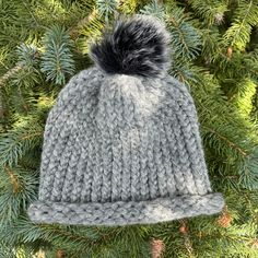 This chunky, cloud soft hat was hand knitted with a 89% acrylic and 11% polyamide yarn Unisex; fits a small-medium adult head or a larger child Pom Pom is removable Hand wash cold, and air dry Storm Grey, Soft Hats, Grey Hat, Air Dry, Hand Knitting, Caps Hats, Accessories Hats, Winter Hats, Pom Pom