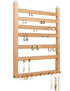 PRICES MAY VARY. Capacity: 6 wooden slats provide space that hold up to 99 pairs of earrings (each slat has 17 holes and 16 slots). 10 knobs across the bottom hold necklaces, bracelets, lanyards, eyeglass holders, scarves, hairbands, and rings. No more tangled mess of earrings and necklaces as in a jewelry box. The Knobs provide length required for short or long necklaces and usually more than one can hang on a knob. Picture Frame Size: Measuring 11 2/5 x 14 1/4inches, which is the normal size o Stud Earring Organizer, Earring Hanger, Wall Mount Jewelry Organizer, Jewelry Frames, Wall Holder, Picture Frame Sizes, Jewelry Organizer Wall, Wood Earring, Hanging Jewelry Organizer