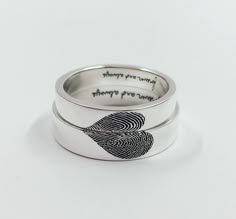 two wedding rings with fingerprints on each one and the words, there are many things