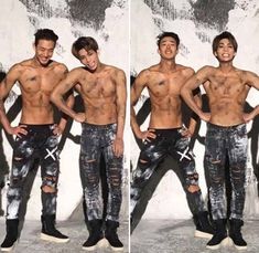 two men with ripped jeans and boots standing in front of a wall