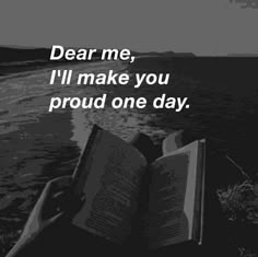 an open book sitting on top of a beach next to the ocean with text that reads dear me, i'll make you proud one day