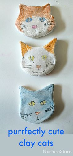 three clay cats sitting next to each other on top of a white surface with text that reads purrfectly cute clay cats