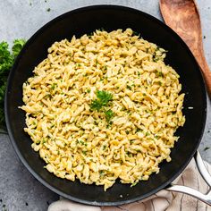 a skillet filled with macaroni and cheese