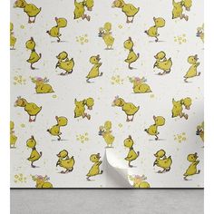 a yellow ducky wallpaper with white background and flowers on the bottom right corner