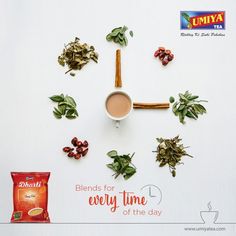 there is a clock made out of tea leaves and spices on the table next to it