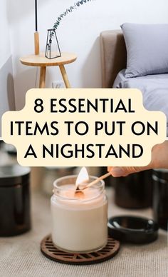 a person lighting a candle with the words 8 essential items to put on a night stand