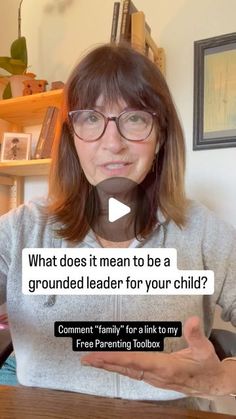 a woman holding her hands out in front of the camera with an ad on it that says, what does it mean to be a grounded leader for your child?