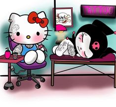 a hello kitty sitting on top of a desk next to a cat