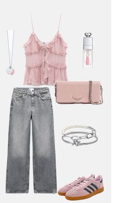 a pink top and jeans outfit with accessories