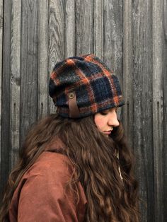 "l love this hat! I designed this hat with a more modern slouchy shape, using the exquisite Harris Tweed which I love to work with in the Autumn and Winter. It is so comfortable and warm as it covers the ears on those cold days. Harris Tweed is hand-woven by islanders in their homes in the Outer Hebrides and is made from pure virgin wool dyed and spun in the Outer Hebrides. This is what entitles it to carry the famous Orb Mark certifying it as Harris Tweed. lined with organic bamboo jersey which Outdoor Slouchy Beanie Cap, Cozy Wool Hats For Fall, Slouchy Outdoor Beanie Cap, One Size Fits Most Bonnet For Outdoor Fall Use, Outdoor Slouchy Beanie Hat, Cozy Fall Cap, One Size Beanie For Fall, One Size Fall Beanie Hat, Slouchy Beanie For Outdoor Fall Activities