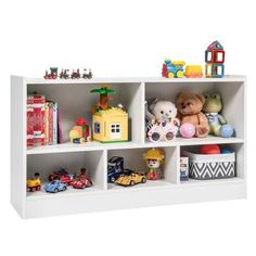 a white shelf filled with lots of toys