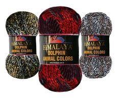 three balls of yarn that are red, black and white with the words himalaya dolprin animal colors