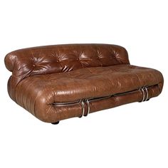 a brown leather futon is shown on a white background