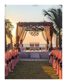 an outdoor ceremony set up with orange and pink decorations on the grass, overlooking the ocean