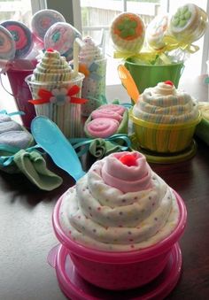 cupcakes and desserts are sitting on the table