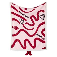 a pink and red towel with hearts on it