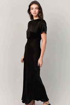 Look elegant in this lightweight maxi midi dress. Featuring short sleeves. a round neckline. and ankle length. it's perfect for a classy dinner or special occasion. The plain design makes this dress timeless and easy to style.Fabric: Cotton. Polyester Modest Black Maxi Dress, Black Modest Bridesmaid Dresses, Japanese Minimalist Fashion, Classy Dinner, Japanese Minimalist, Short Maxi Dress, Hot Jumpsuits, Modest Bridesmaid Dresses, Dress With Short Sleeves