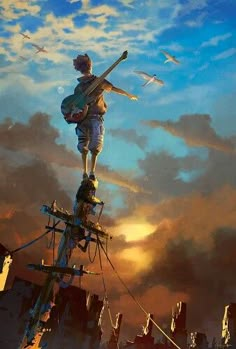 a man standing on top of a wooden pole with a guitar in his hand and birds flying above him