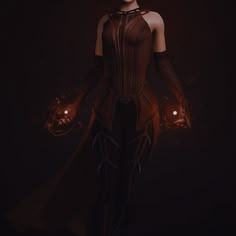 a woman dressed in dark clothing with glowing hands and lights on her chest, standing against a black background